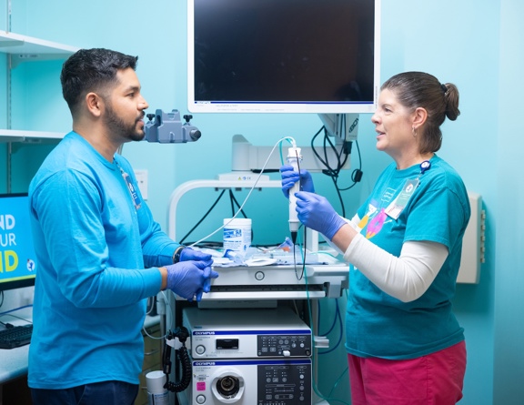 clinicians with medical equipment 