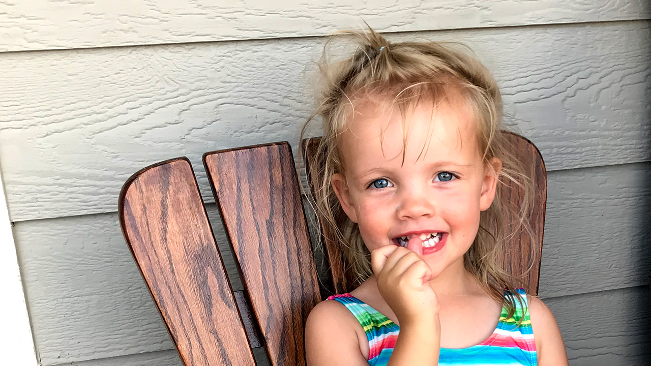 Ava sitting in a chair