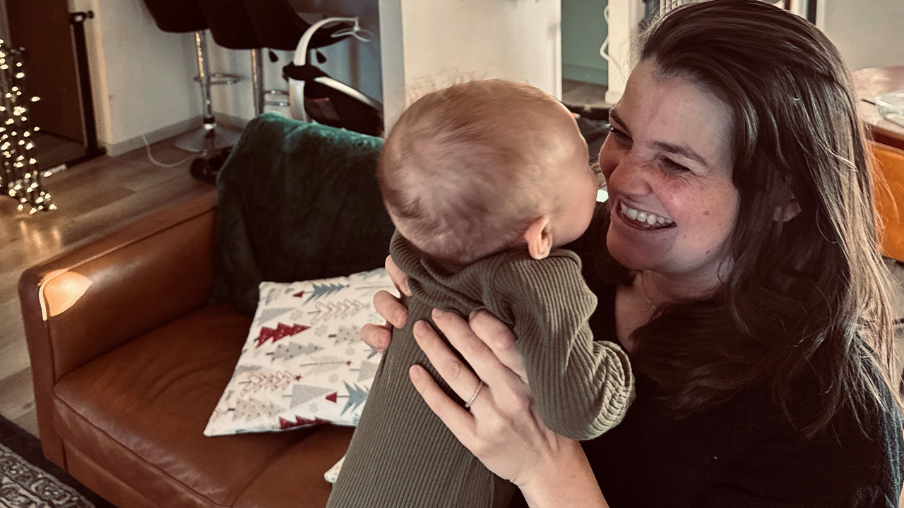 Bethany holds her young son, Declan, at Christmas time.