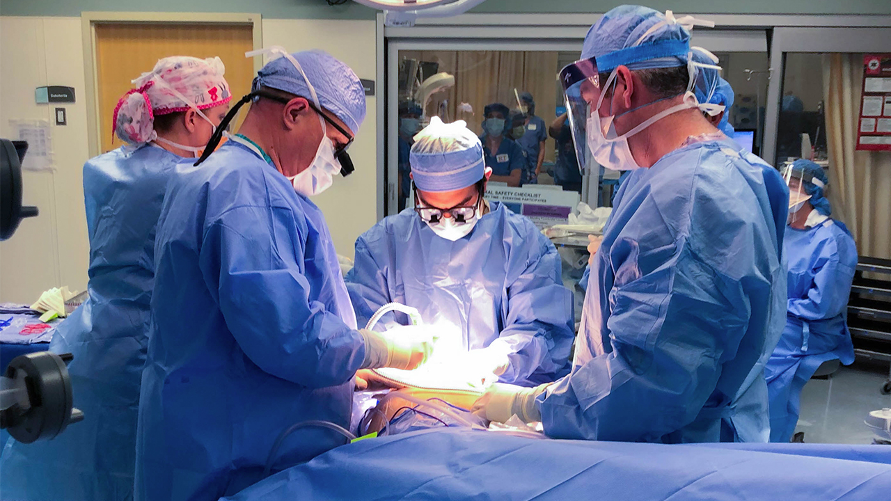 Ella EXIT Procedure 2 surgeons in surgery.jpg