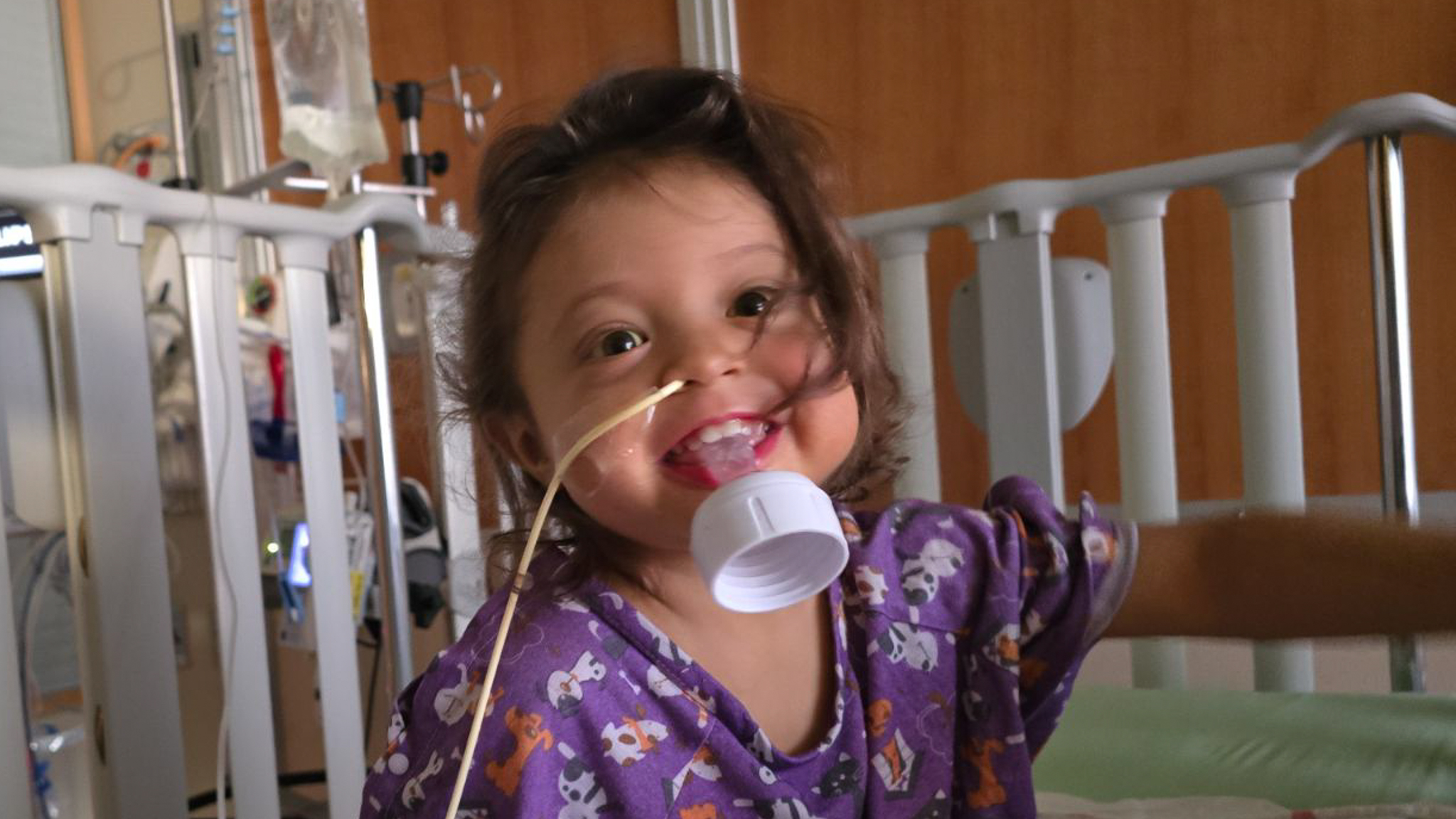 Emma plays her in her crib at Children’s Hospital Colorado where she got her liver transplant.