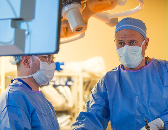 surgical team in a performing an operation in a clinic setting