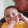 Dad Kelly kisses his son on the head. His son is being treated for HLHS at Children's Hospital Colorado.