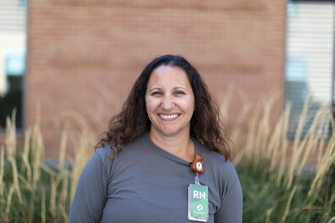 Stevie Angelo, a clinical nurse in the Cardiac Intensive Care Unit, providing specialized care.