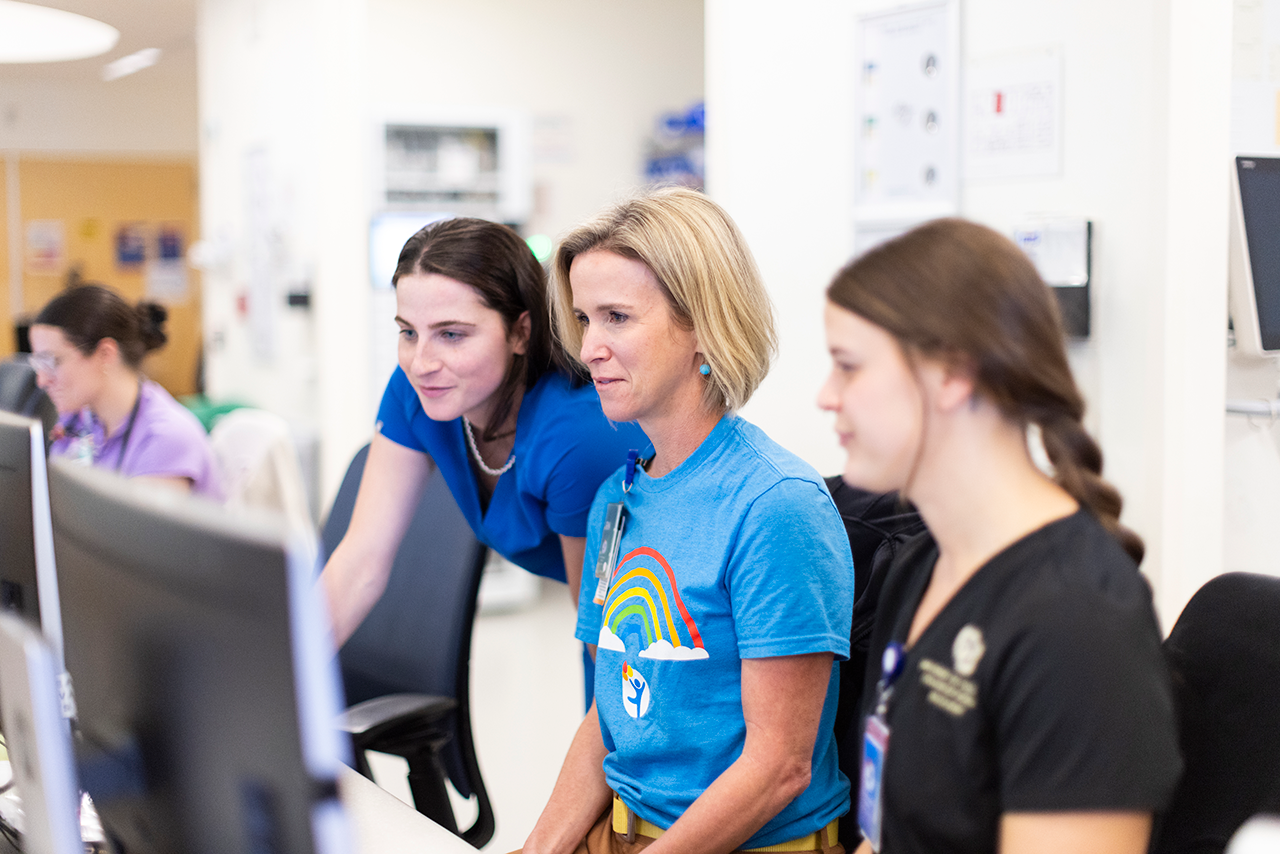 Banner for the Patient Care Services 2025 Annual Report featuring a group of diverse pediatric healthcare professionals.