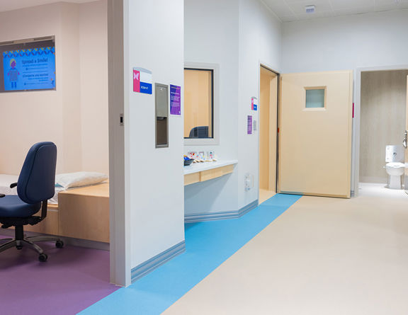 Healthcare providers in a specialized behavioral health unit coordinating crisis care.