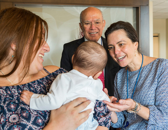 Pediatric colorectal surgeons Andrea Bischoff, MD, and Alberto Peña, MD, meet Linda Sibilia’s son, Benjamin Nieto. Linda was born with a urogenital malformation called cloaca, which Dr. Peña reconstructed 30 years ago.
