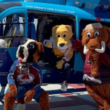 Colorado Avalanche, Denver Nuggets and Colorado Mammoth mascots on a helicopter.  