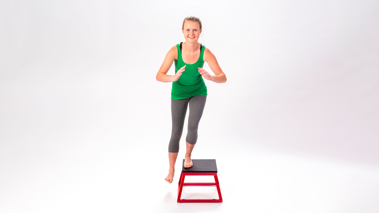 A teenager does balance and strengthening exercises