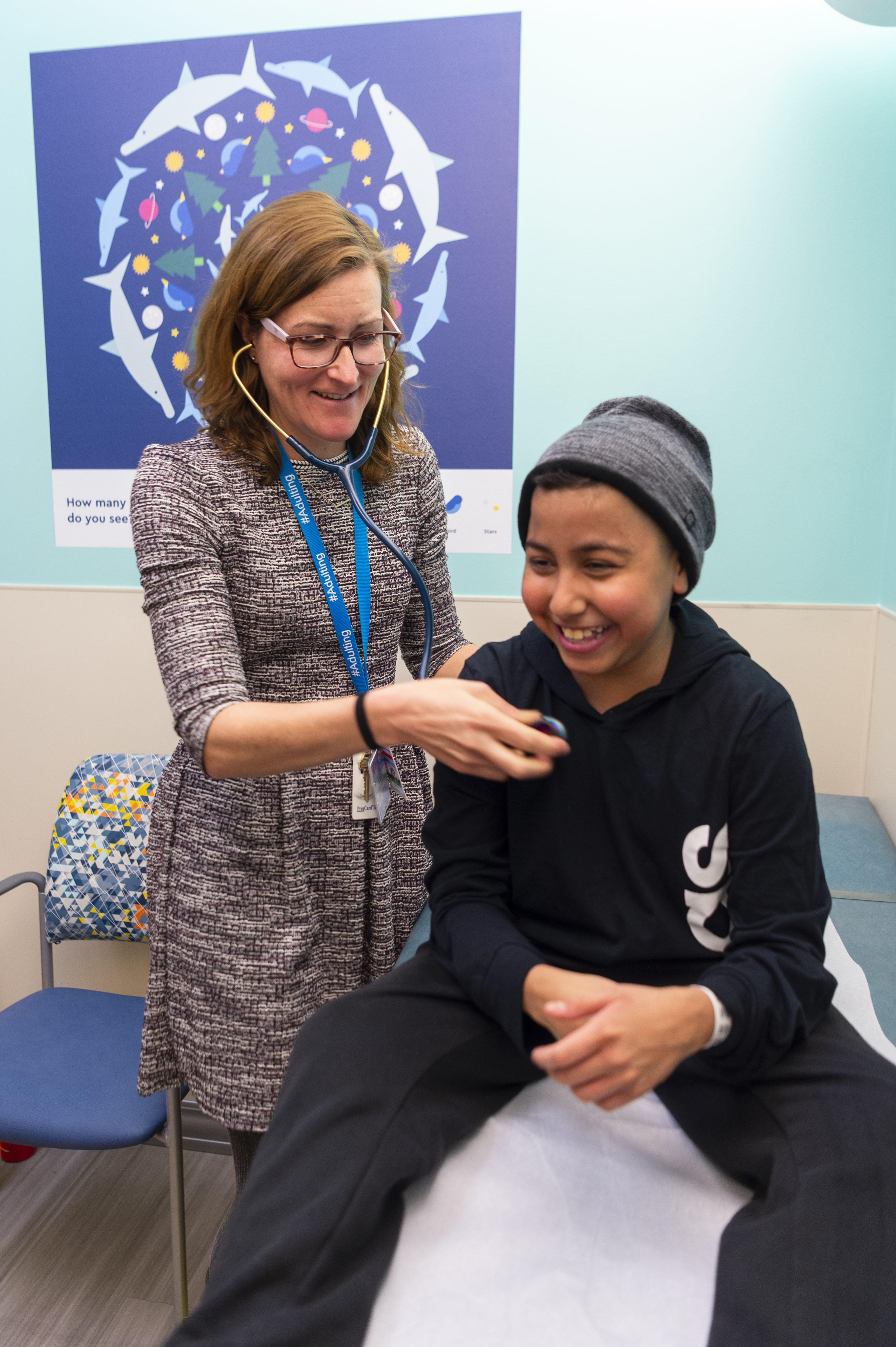 Provider uses stethoscope on patient